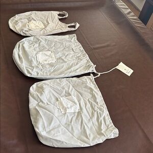 Coyuchi Three Linen Sheets bags. Brand new.